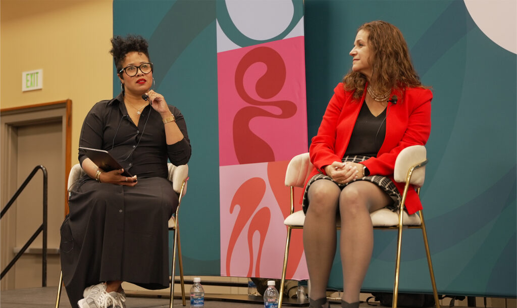 Amber on Stage at a Talk