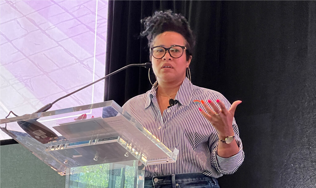 Amber on Stage at a Talk